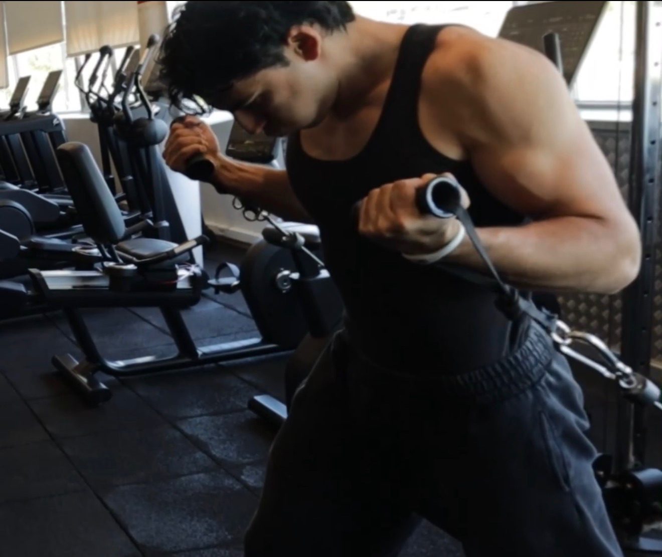 Edis doing cable curls